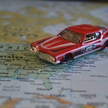 Toy car on top of a map