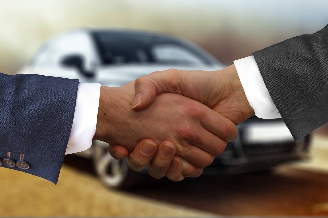 Handshake after insuring a car