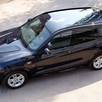 BMW X3 Black Car with tinted windows
