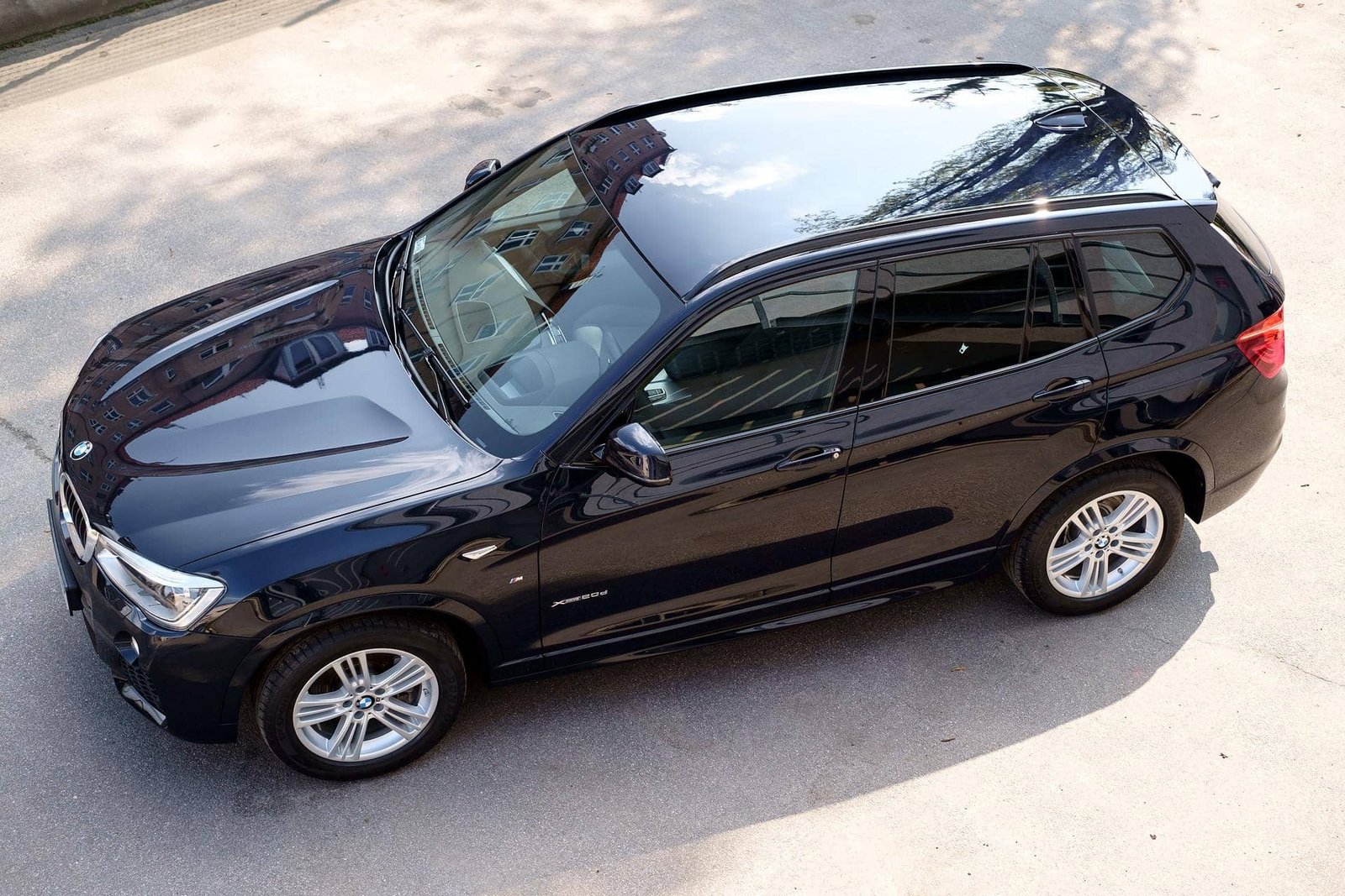 BMW X3 Black Car with tinted windows